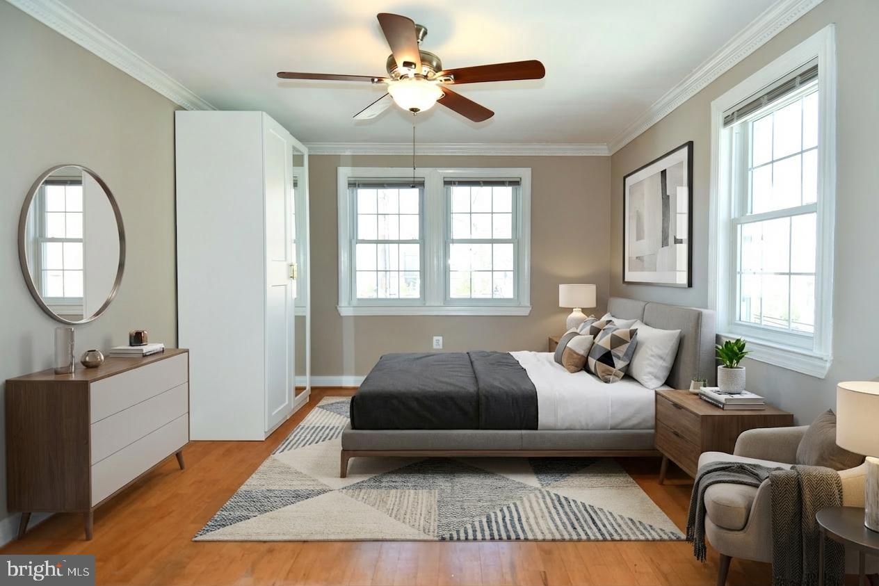 2625 3rd Street Northeast, Unit 301 Washington, DC 20002 - Photo 17 of 21 a bedroom with a large bed and a window