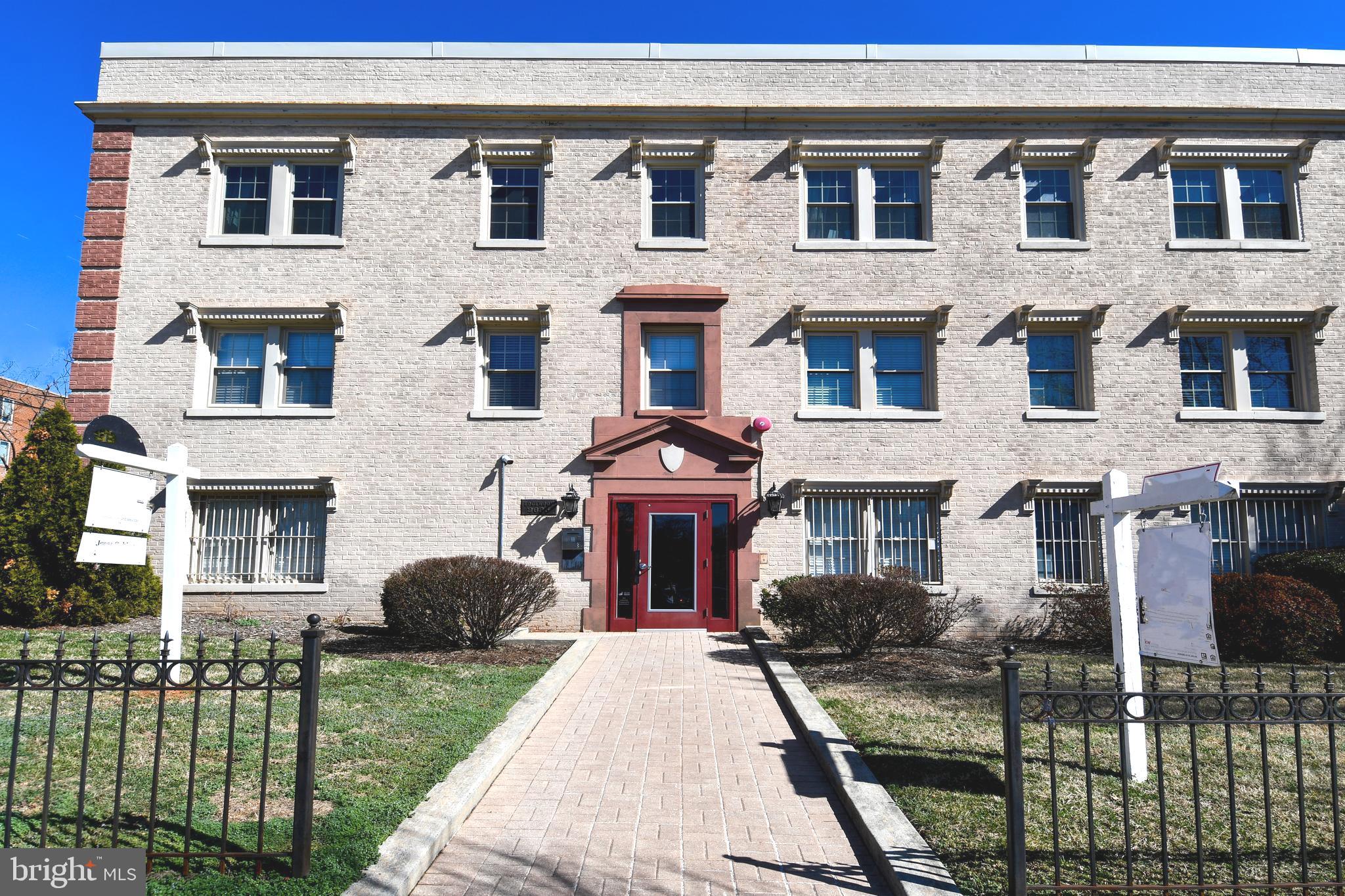 2625 3rd Street Northeast, Unit 301 Washington, DC 20002 - Photo 2 of 21 a front view of a house with a garden