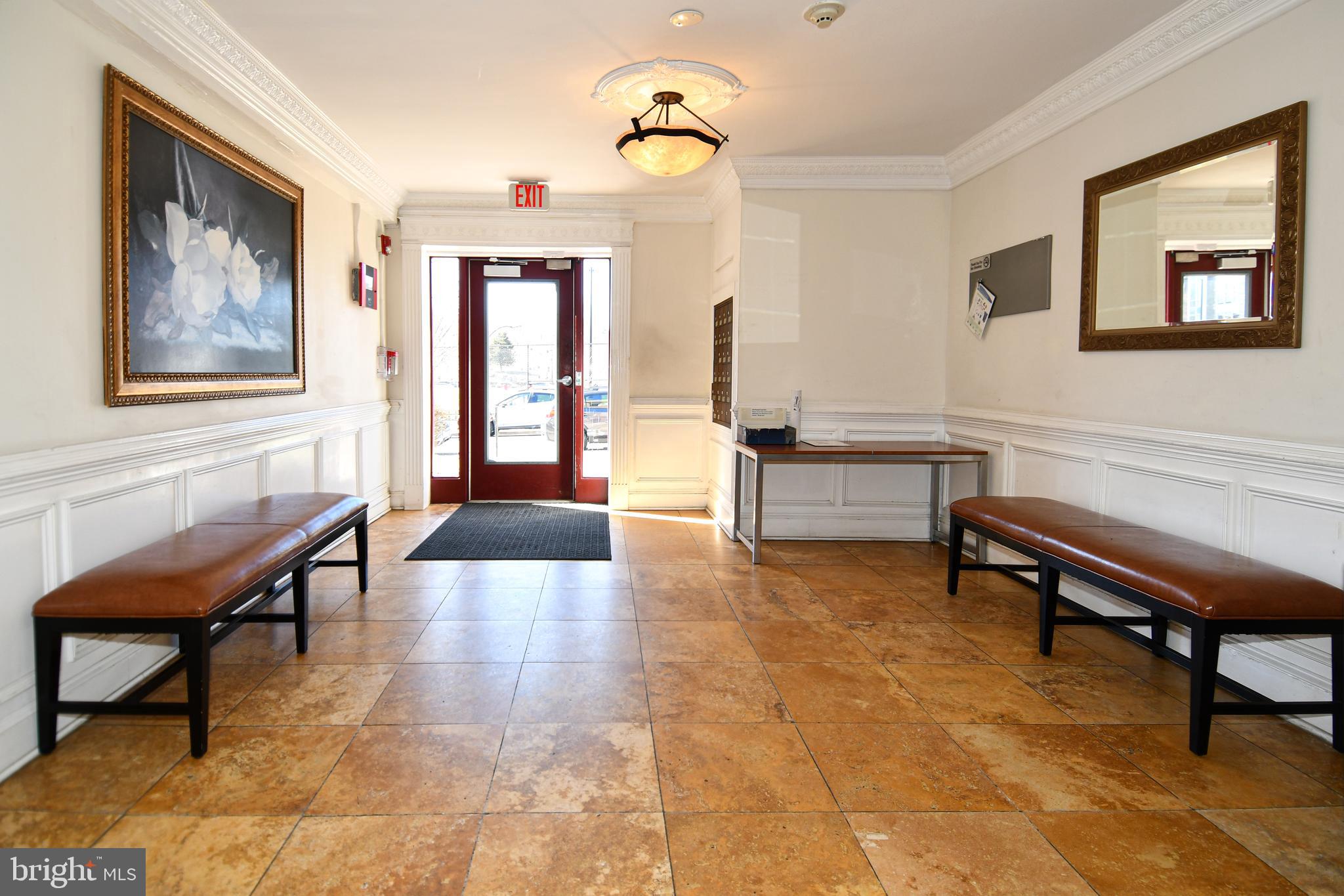 2625 3rd Street Northeast, Unit 301 Washington, DC 20002 - Photo 3 of 21 a living room with furniture and a piano