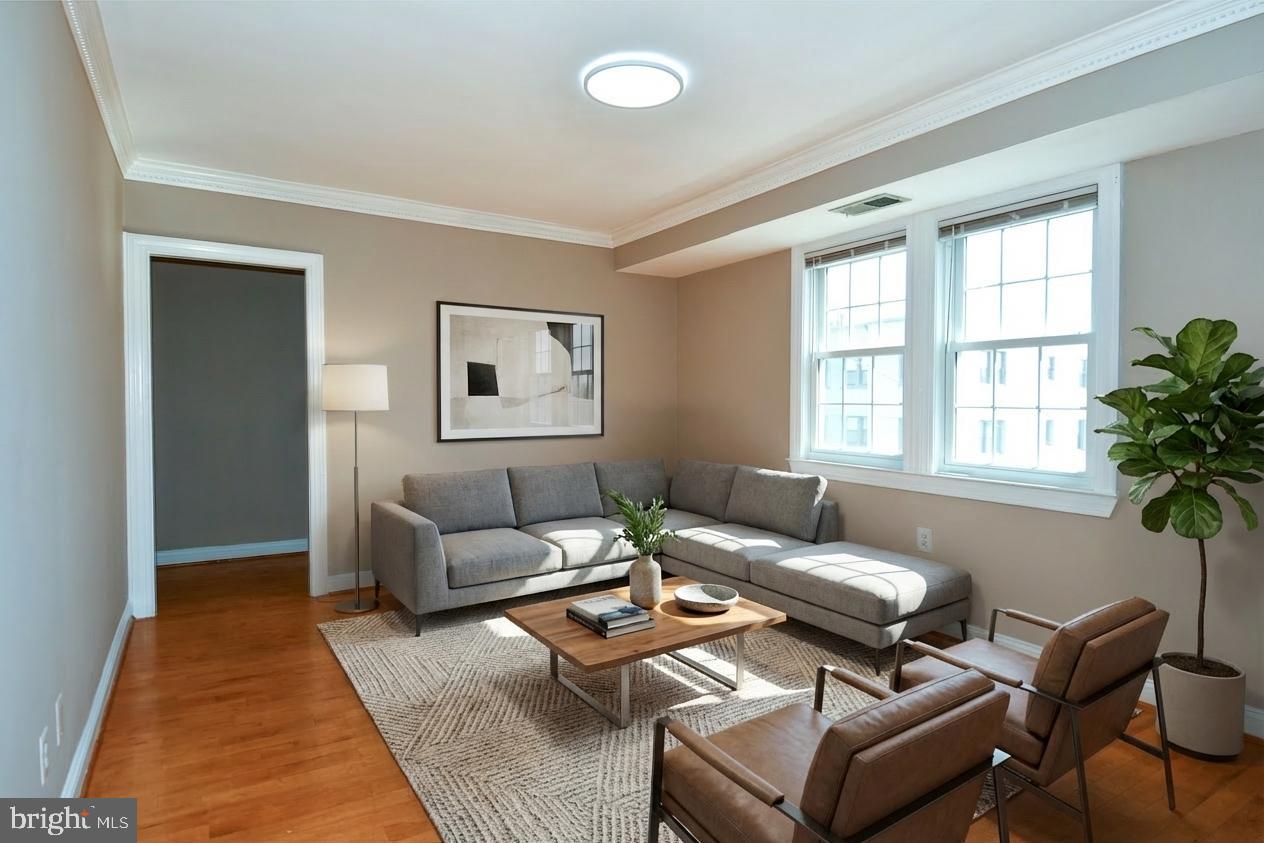 2625 3rd Street Northeast, Unit 301 Washington, DC 20002 - Photo 6 of 21 a living room with furniture and a window