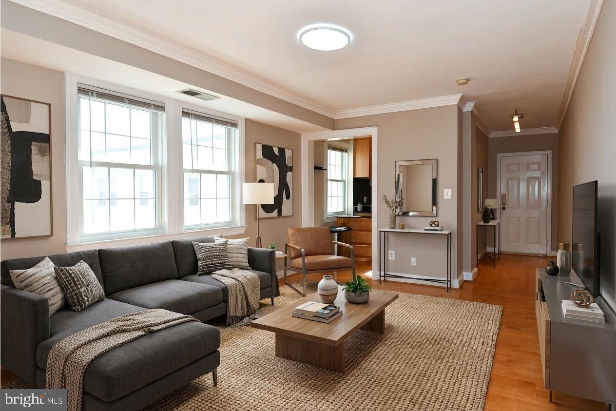 2625 3rd Street Northeast, Unit 301 Washington, DC 20002 - Photo 8 of 21 a living room with furniture windows and a flat screen tv