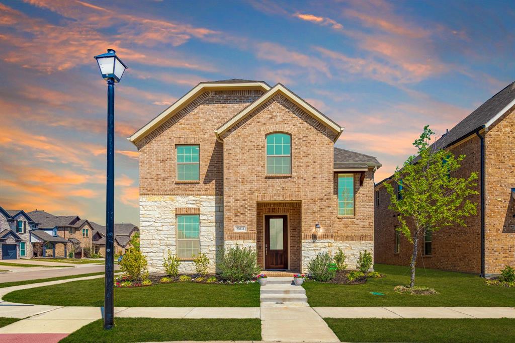 564 Embargo Drive Fate, TX 75189 - Photo 1 of 1 a front view of a house with a yard