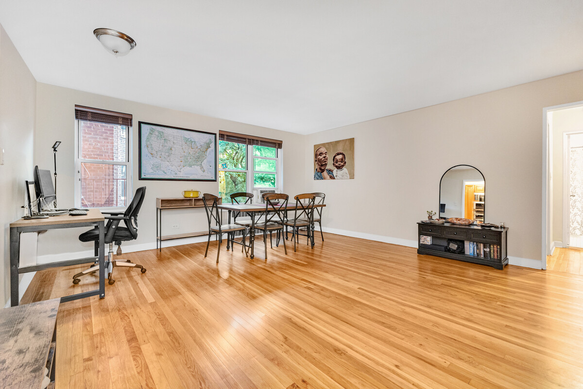 67-07 Yellowstone Boulevard, Unit 3H Queens, NY 11375 - Photo 6 of 6 a living room with furniture
