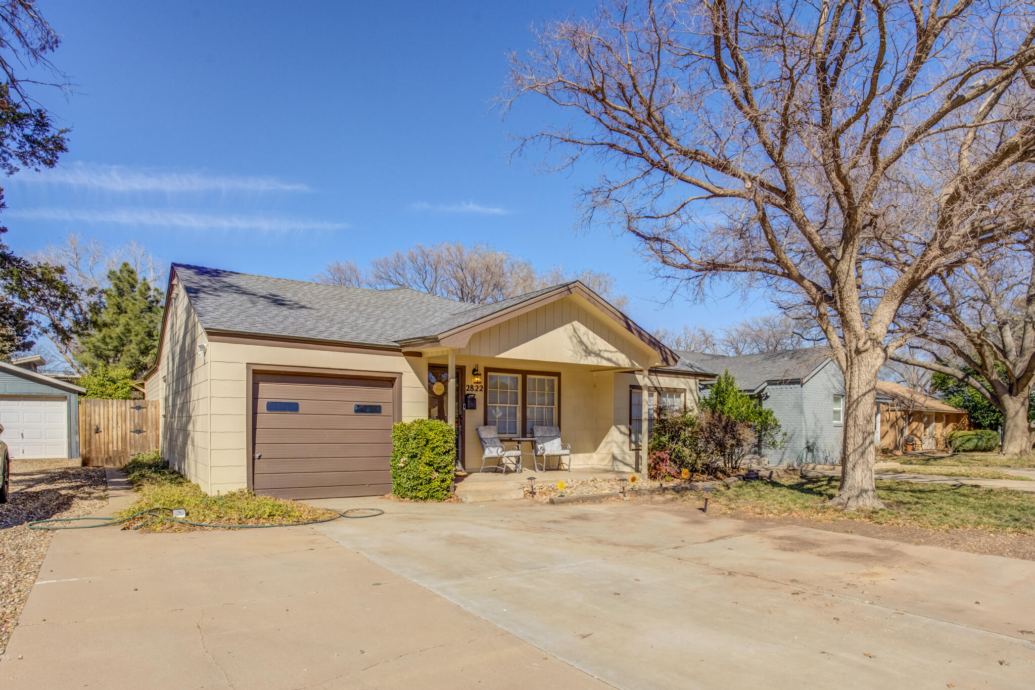 front view of a house with a street