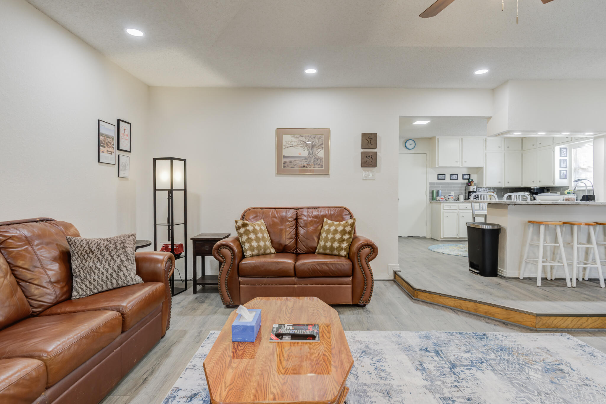 2822 23rd Street Lubbock, TX 79410 - Photo 20 of 39 a living room with furniture and kitchen view