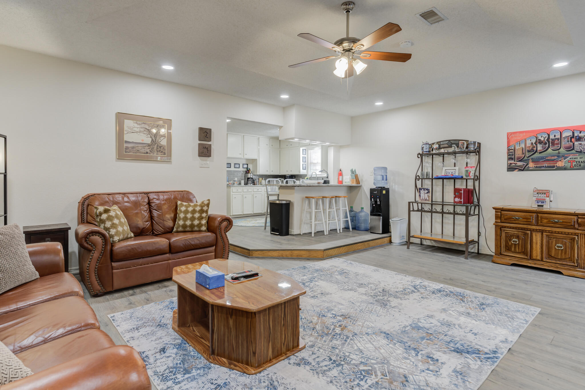 2822 23rd Street Lubbock, TX 79410 - Photo 21 of 39 a living room with furniture and kitchen view