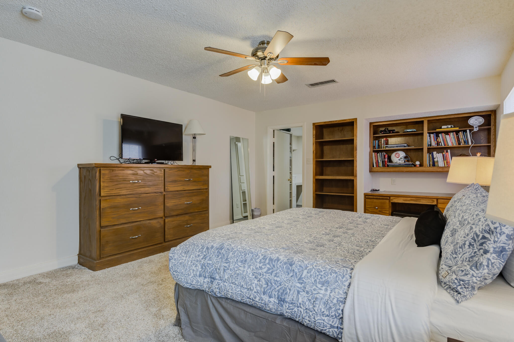 2822 23rd Street Lubbock, TX 79410 - Photo 31 of 39 a bedroom with a bed and furniture