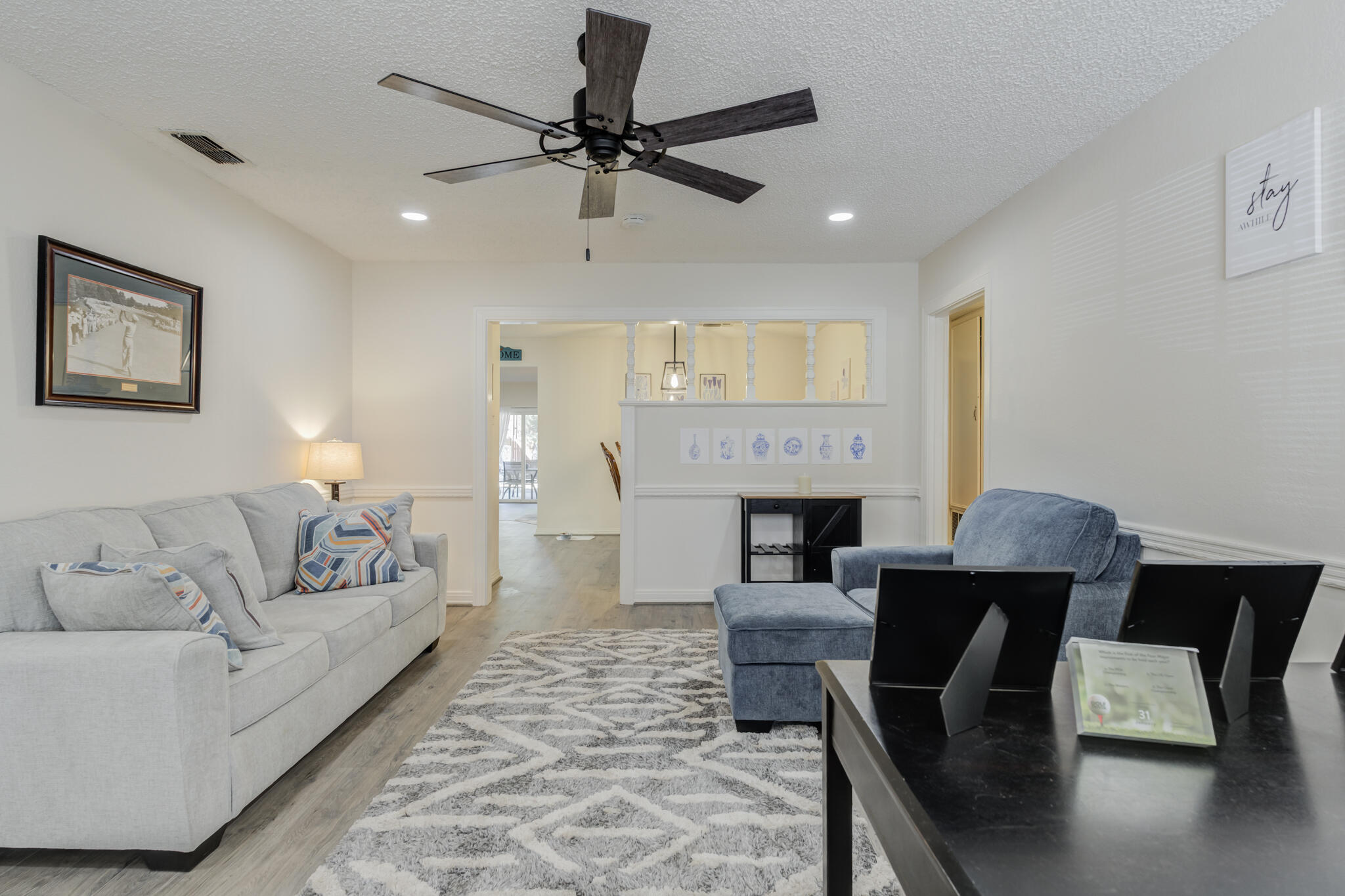 2822 23rd Street Lubbock, TX 79410 - Photo 4 of 39 a living room with furniture and a fireplace