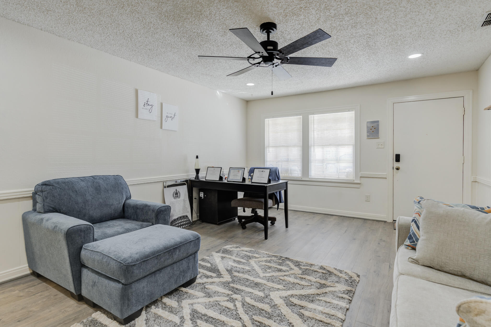 2822 23rd Street Lubbock, TX 79410 - Photo 7 of 39 a living room with furniture and a window