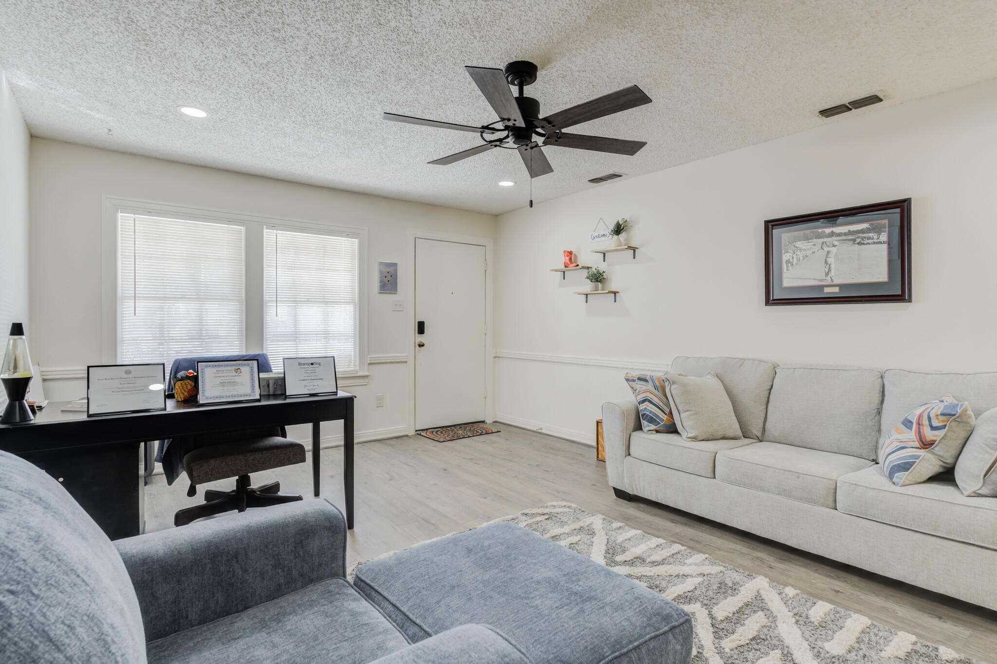 2822 23rd Street Lubbock, TX 79410 - Photo 8 of 39 a living room with furniture and a window