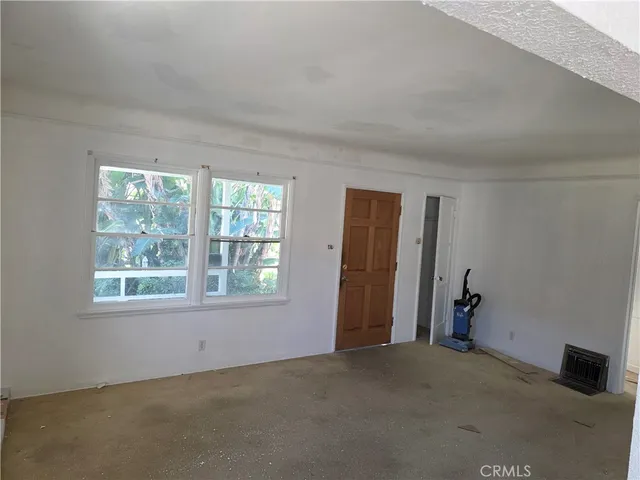 a view of a livingroom with a staircase