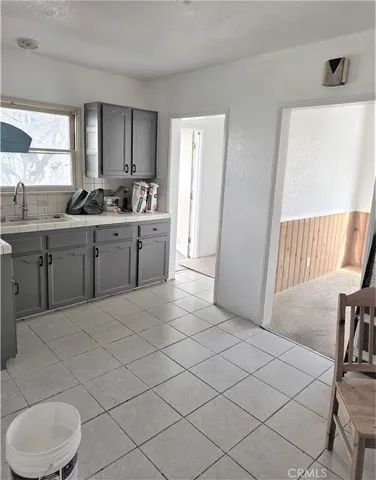 a house with a tree in the background