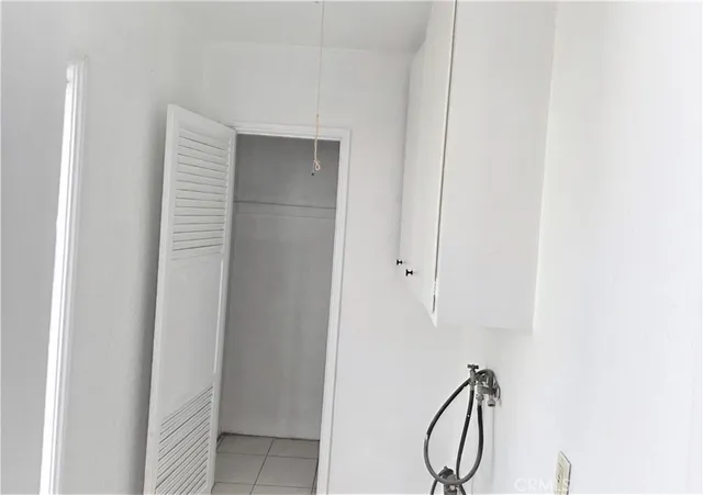 a view of a swimming pool with sitting area