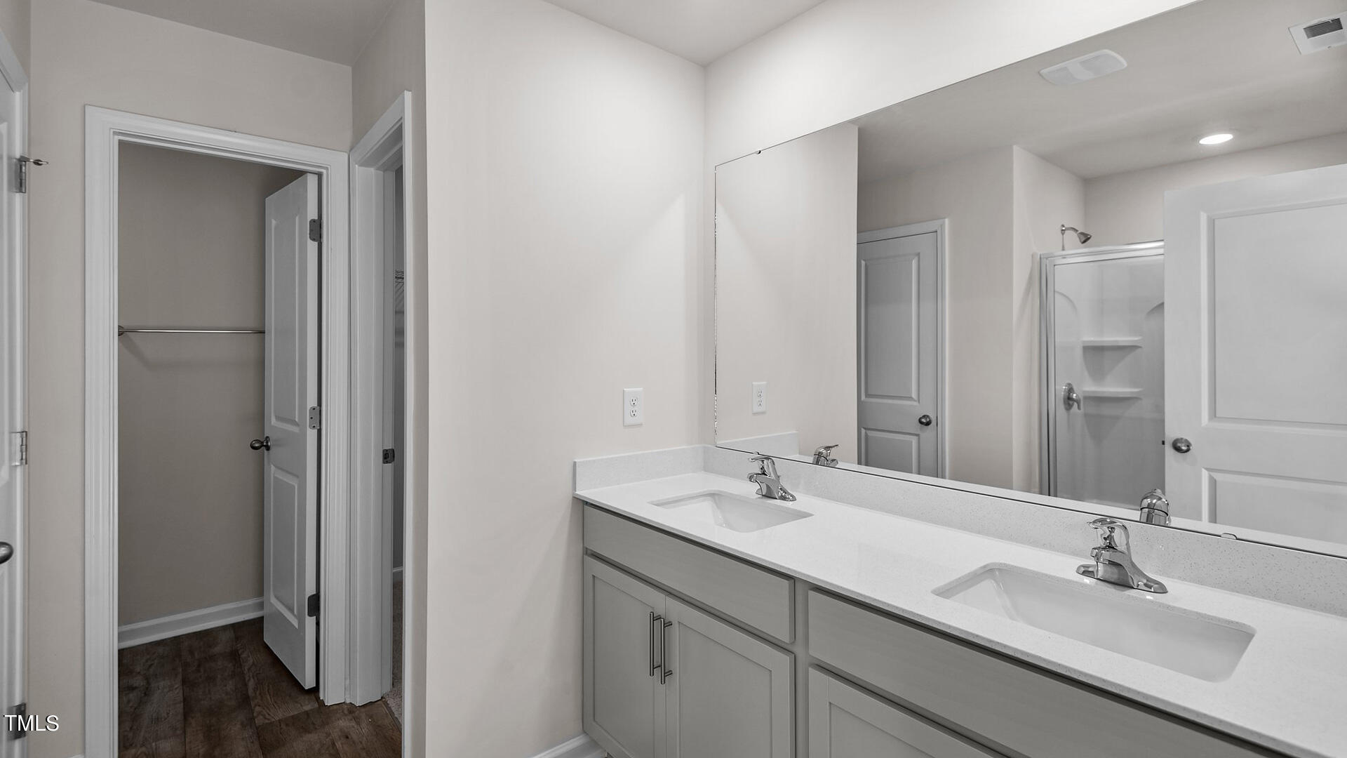 6017 Howth Way Raleigh, NC 27610 - Photo 14 of 21 a bathroom with a double vanity sink mirror and double