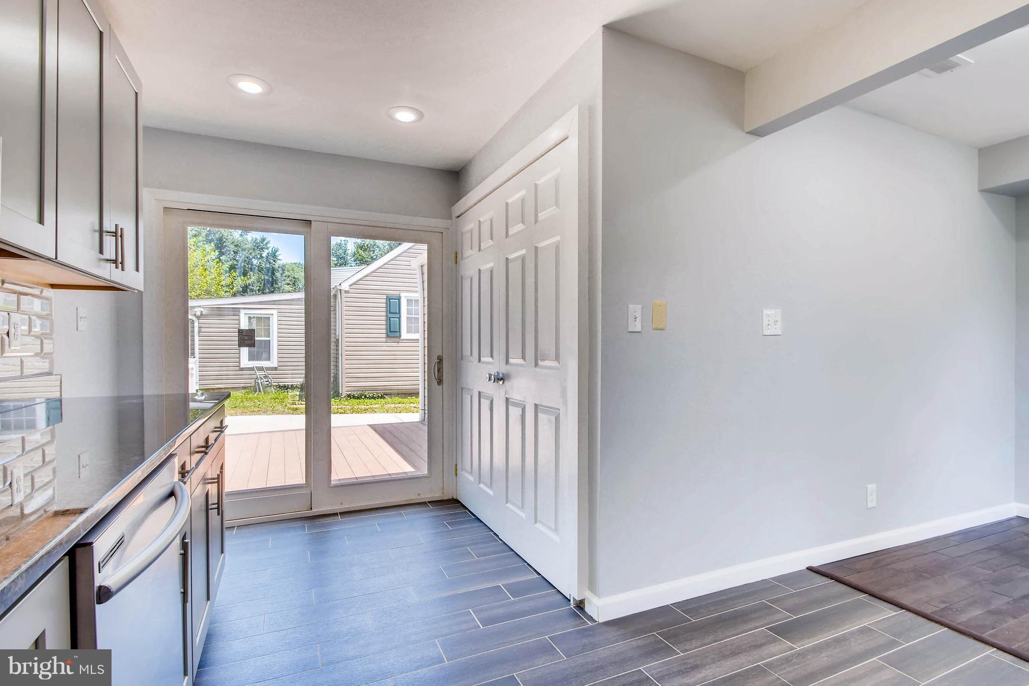 10 Village Road Pikesville, MD 21208 - Photo 6 of 28 access to backyard & laundry on main