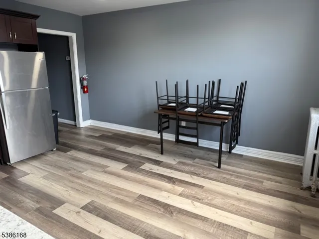 a view of a workspace with furniture