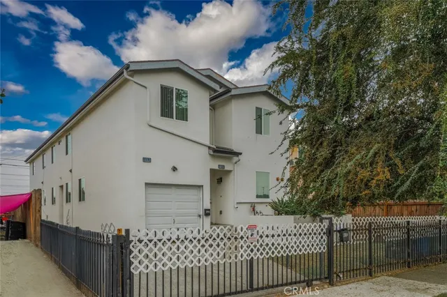 a house view with a backyard space