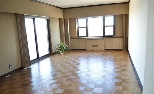 an empty room with windows