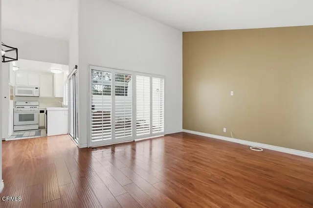 a view of a livingroom with wooden floor