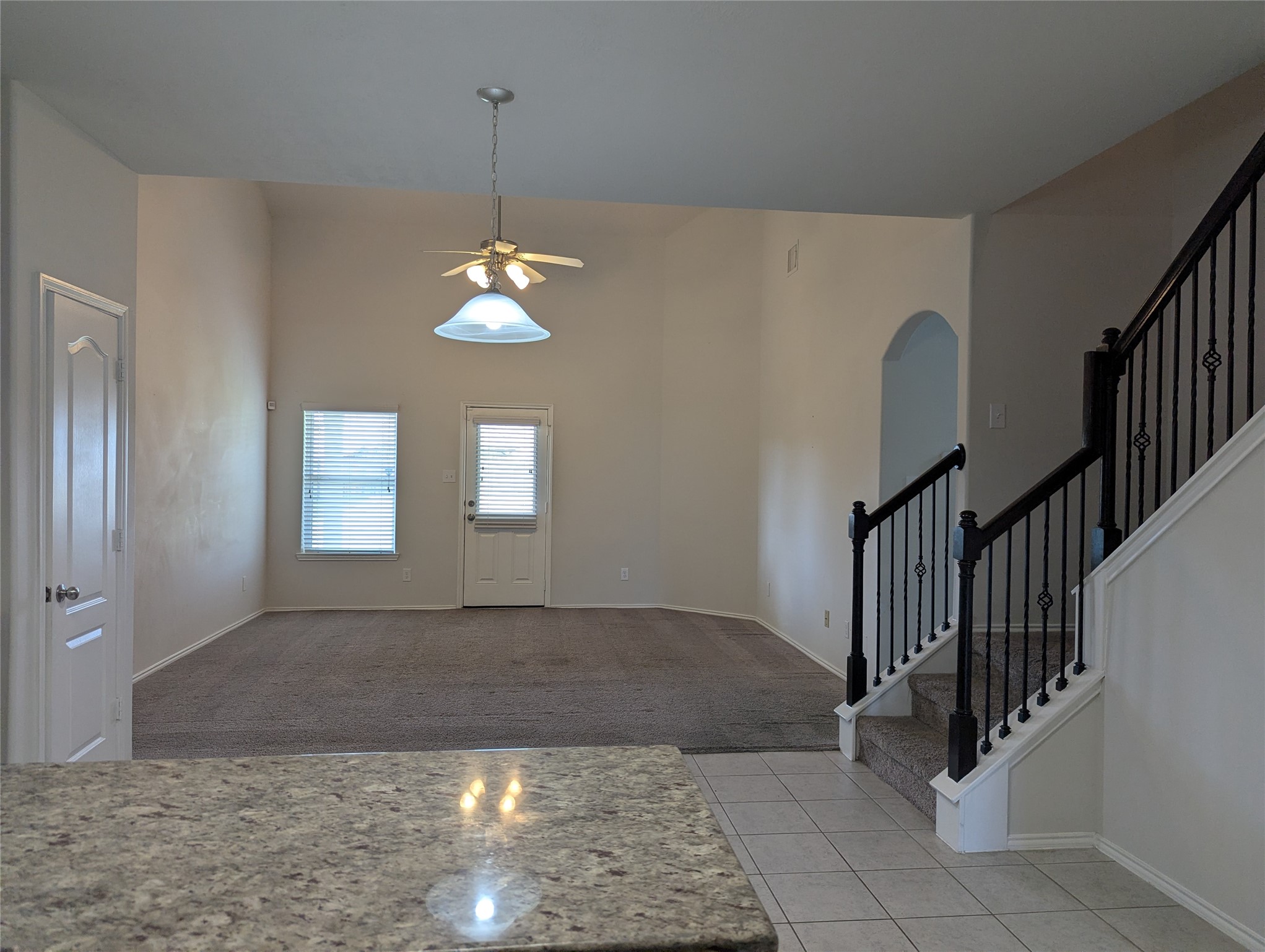 13319 Lansdown Street Rosharon, TX 77583 - Photo 6 of 22 a view of a hallway with entryway and chandelier
