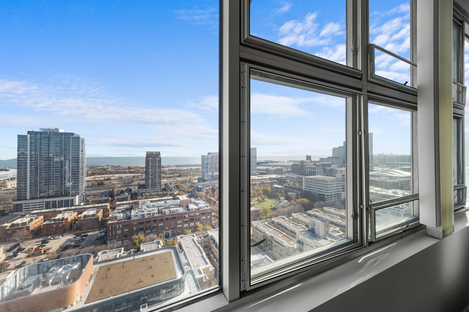 1720 South Michigan Avenue, Unit 2307 Chicago, IL 60616 - Photo 15 of 15 a view of a city from a window