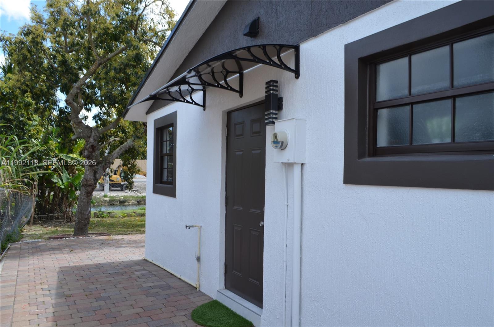 29925 Southwest 143rd Court Homestead, FL 33033 - Photo 23 of 40 a view of a house with a small yard