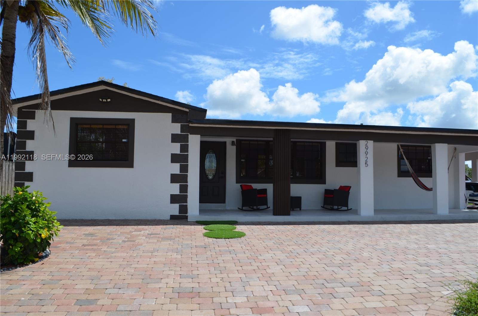 29925 Southwest 143rd Court Homestead, FL 33033 - Photo 40 of 40 a view of a house with a yard