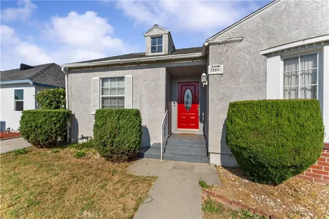 front view of a house with a small yard