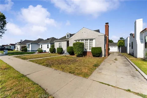 a front view of a house with a porch