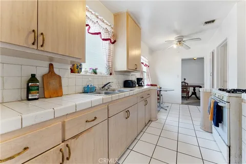a bathroom with a sink a vanity and a mirror