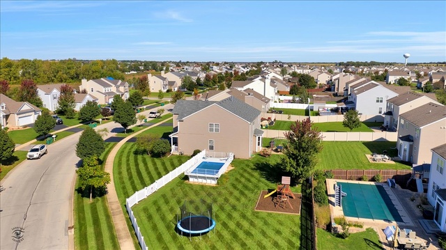 25405 Spring Street Manhattan, IL 60442 - Photo 5 of 36 an aerial view of a house with a swimming pool