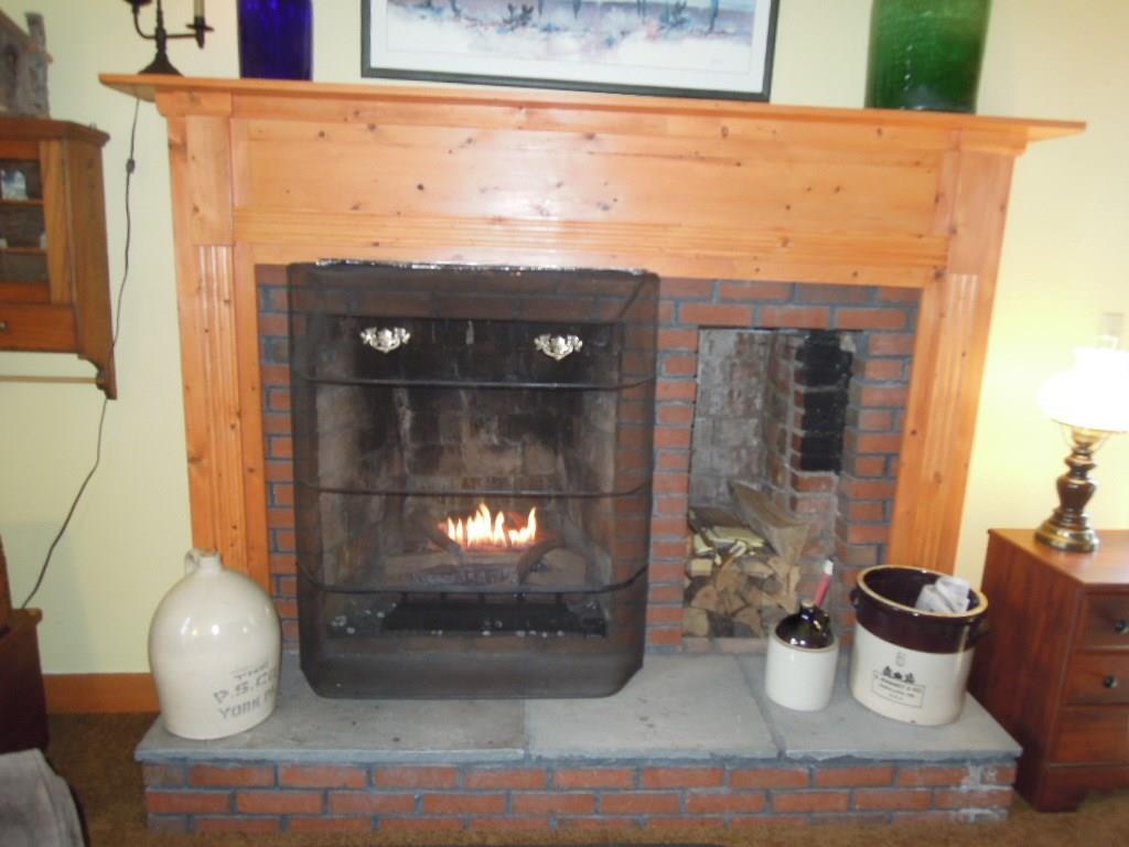 463 New Sweden Road New Sweden, ME 04762 - Photo 13 of 33 Custom surround and mantle.