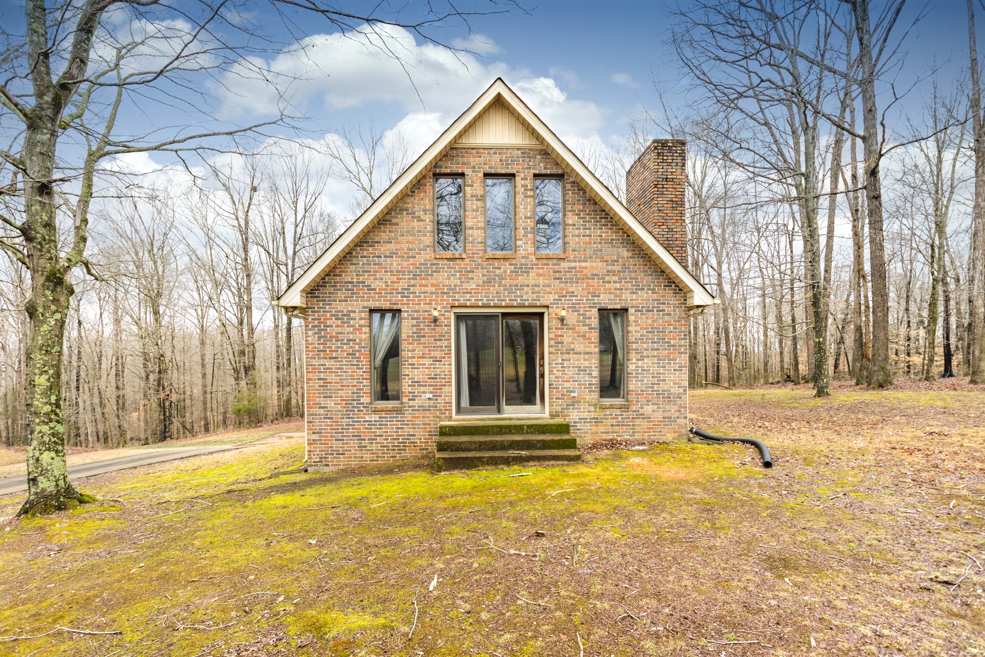 338 Black Road Dickson, TN 37055 - Photo 1 of 22 a front view of a house with a yard