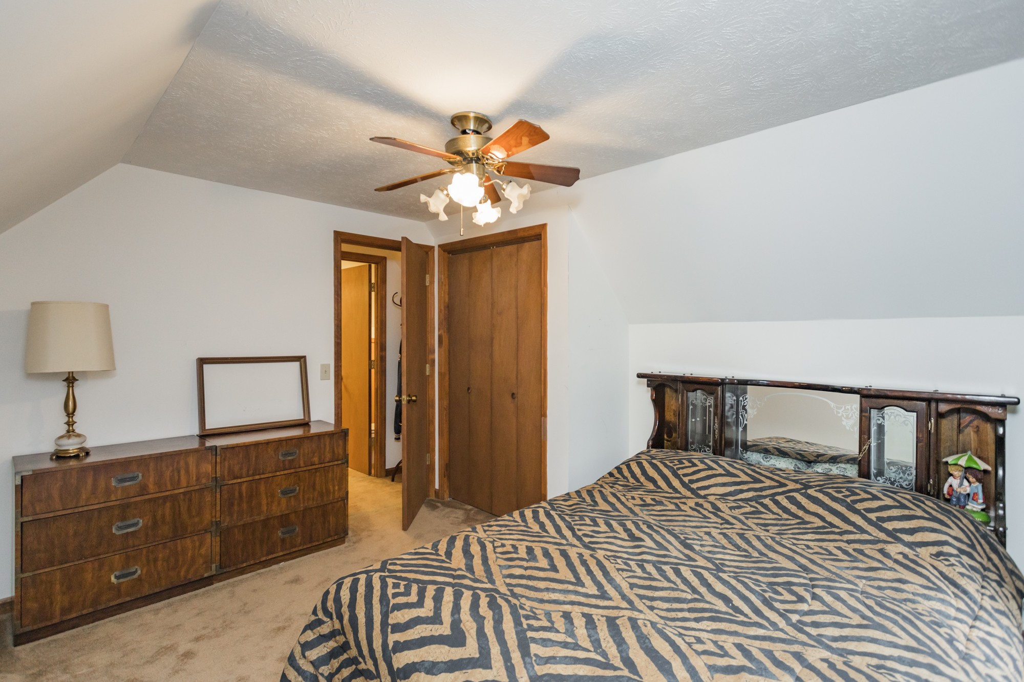 338 Black Road Dickson, TN 37055 - Photo 12 of 22 a bedroom with a bed and a dresser
