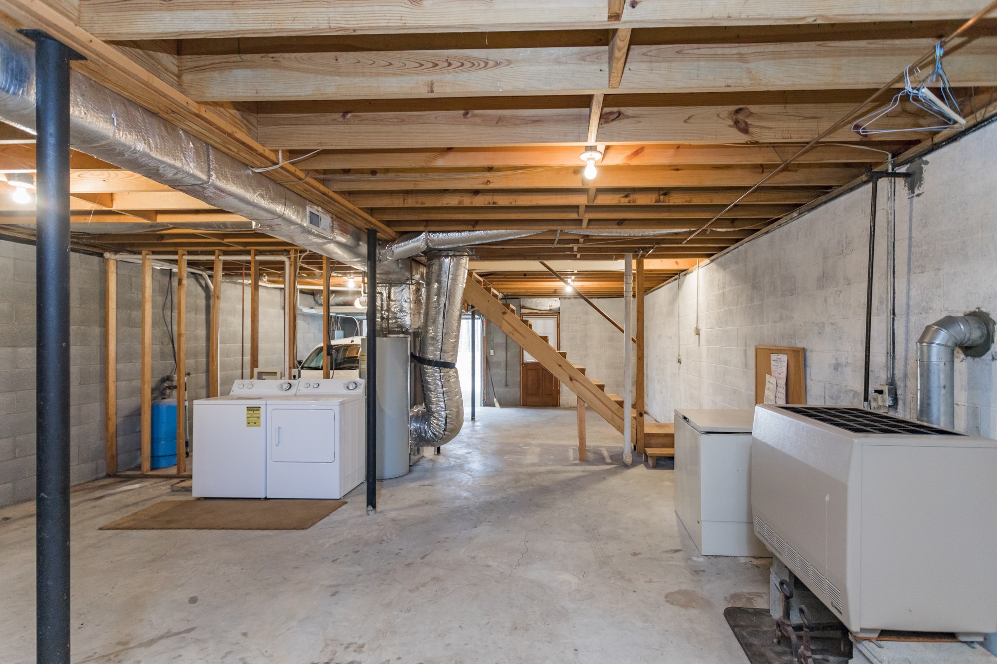 338 Black Road Dickson, TN 37055 - Photo 16 of 22 a view of a storage room with an empty shelves