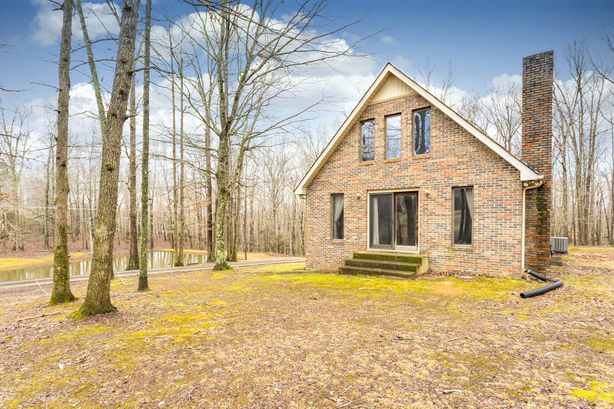 338 Black Road Dickson, TN 37055 - Photo 19 of 22 a view of a house with a swimming pool
