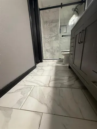a view of a bathroom with a shower