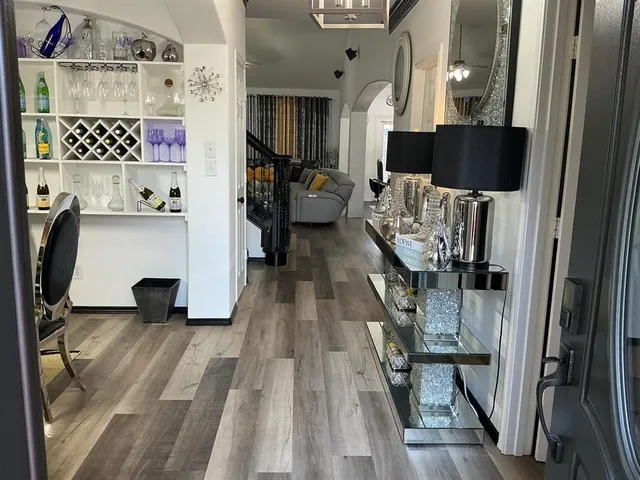 a view of living room with furniture and flat screen tv
