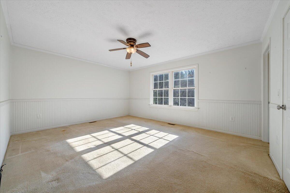 365 Isolane Road Callaway, VA 24067 - Photo 19 of 104 a view of empty room with windows