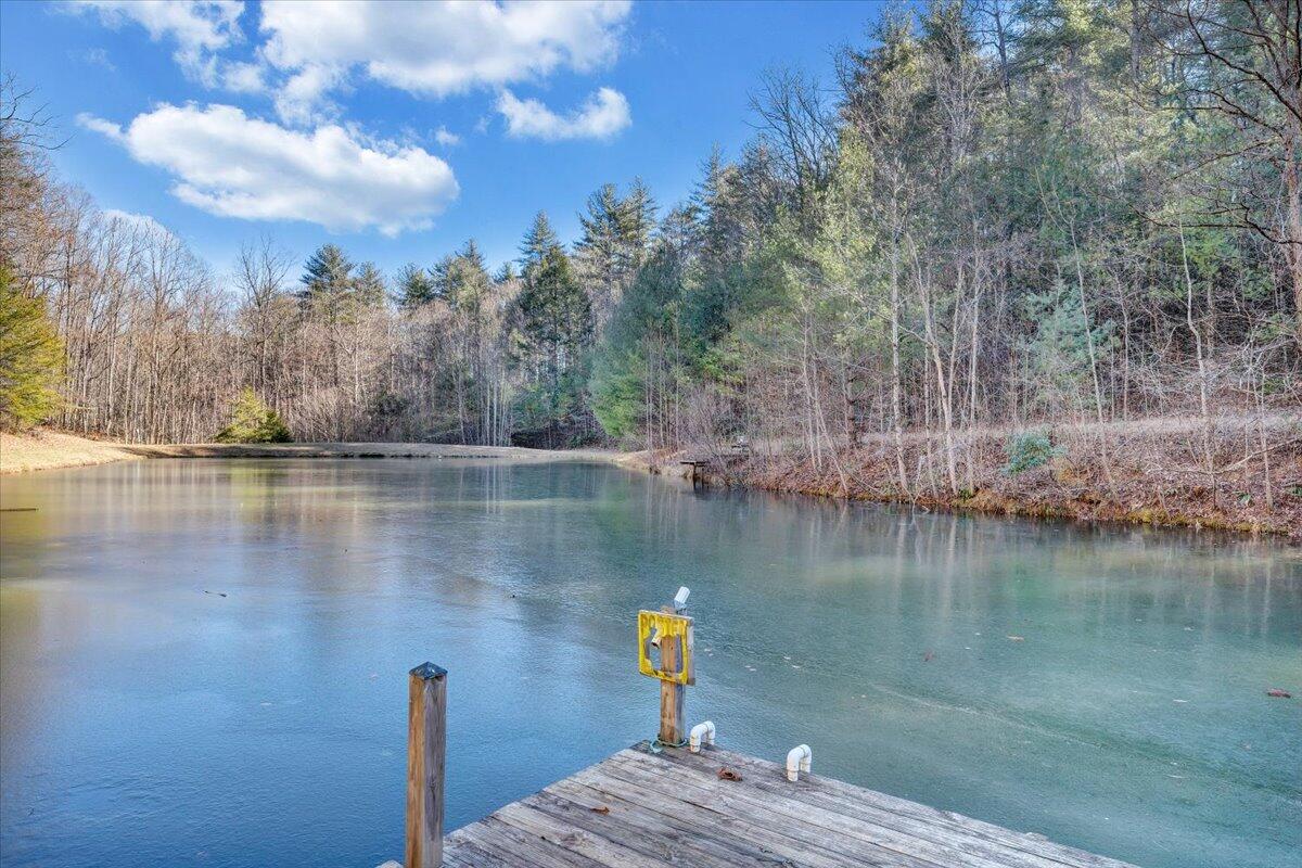 365 Isolane Road Callaway, VA 24067 - Photo 3 of 104 a view of a lake in between two chairs