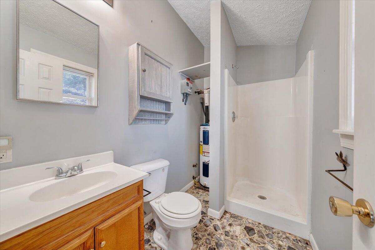 365 Isolane Road Callaway, VA 24067 - Photo 72 of 104 a bathroom with a sink toilet and shower