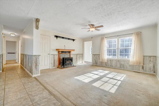 a view of a kitchen with a sink and cabinets