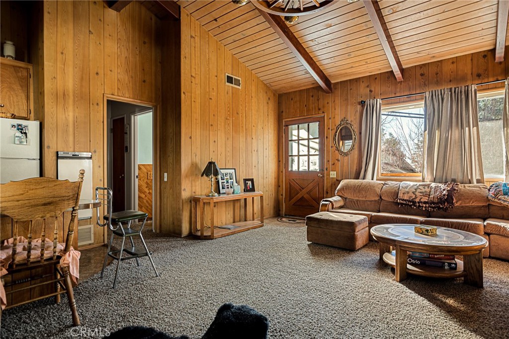 1164 Bear Springs Road Rimforest, CA 92378 - Photo 5 of 18 a living room with furniture and a large window