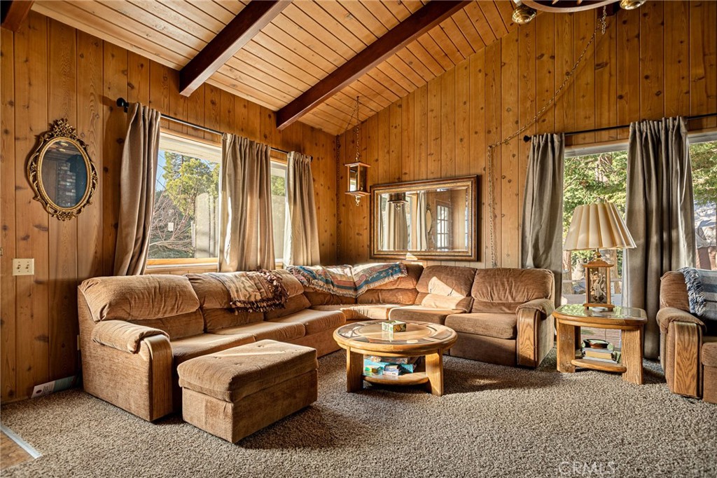 1164 Bear Springs Road Rimforest, CA 92378 - Photo 8 of 18 a living room with furniture and a large window