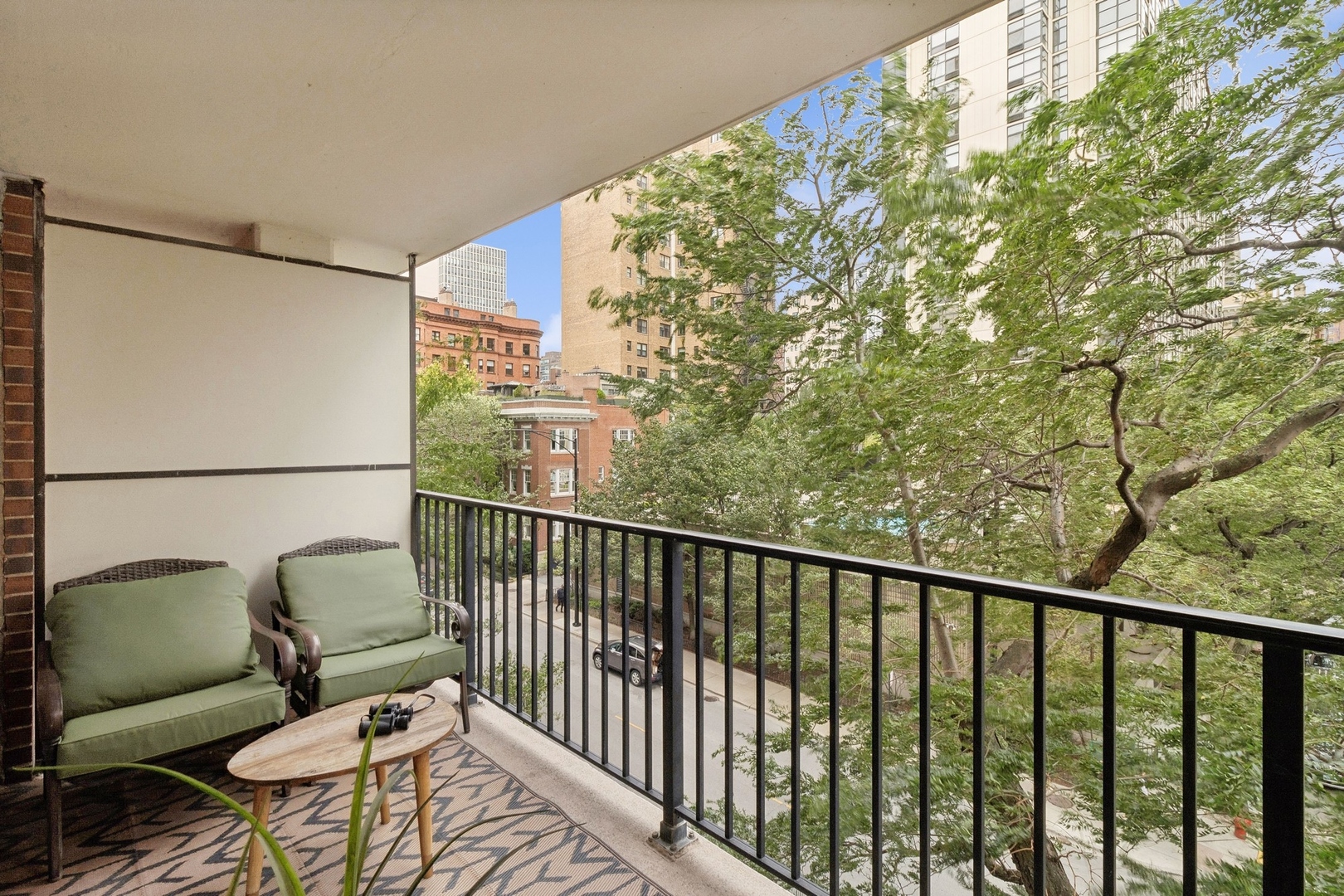 71 East Division Street, Unit 401 Chicago, IL 60611 - Photo 12 of 21 a balcony with wooden floor