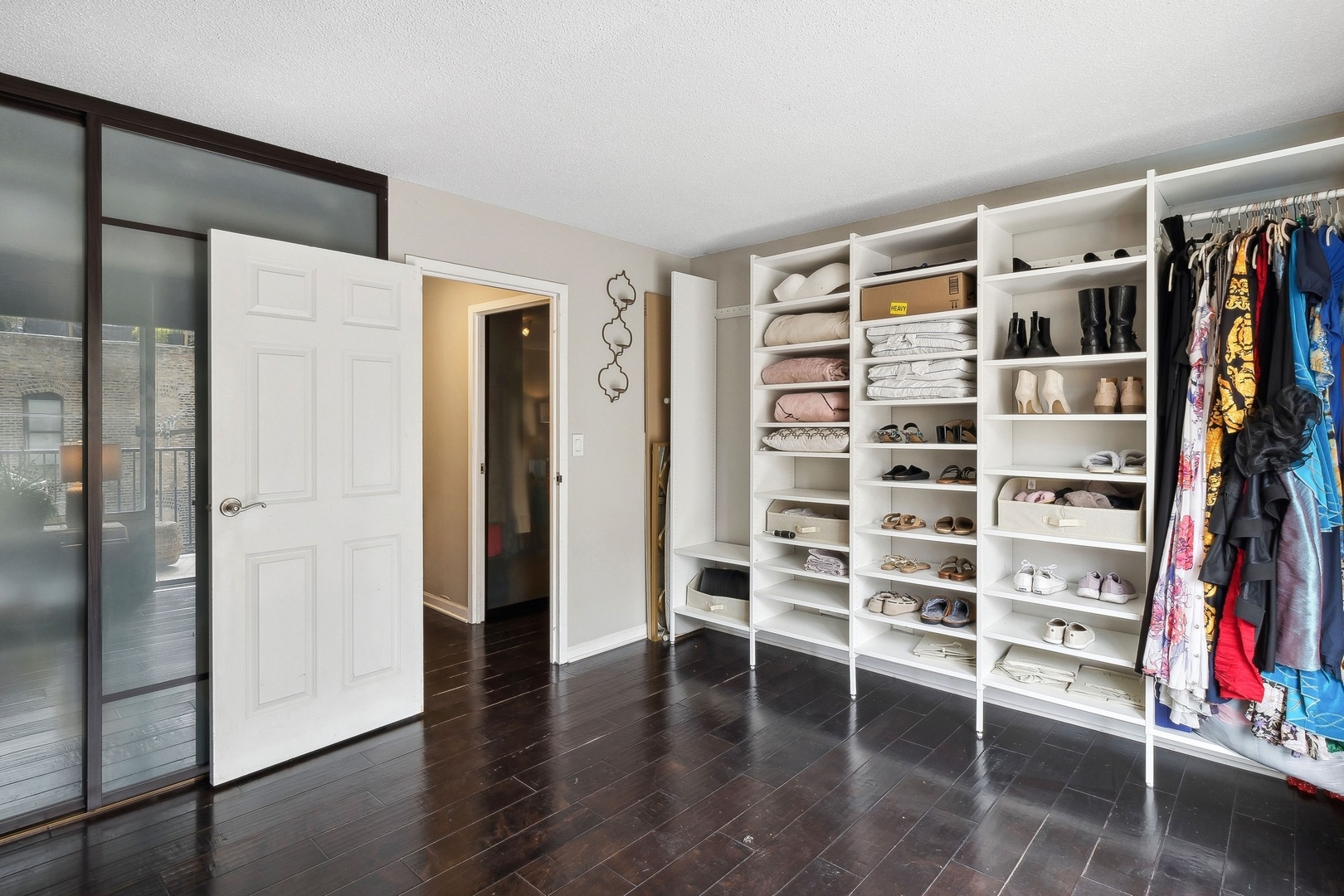 71 East Division Street, Unit 401 Chicago, IL 60611 - Photo 17 of 21 a view of walk in closet with empty racks