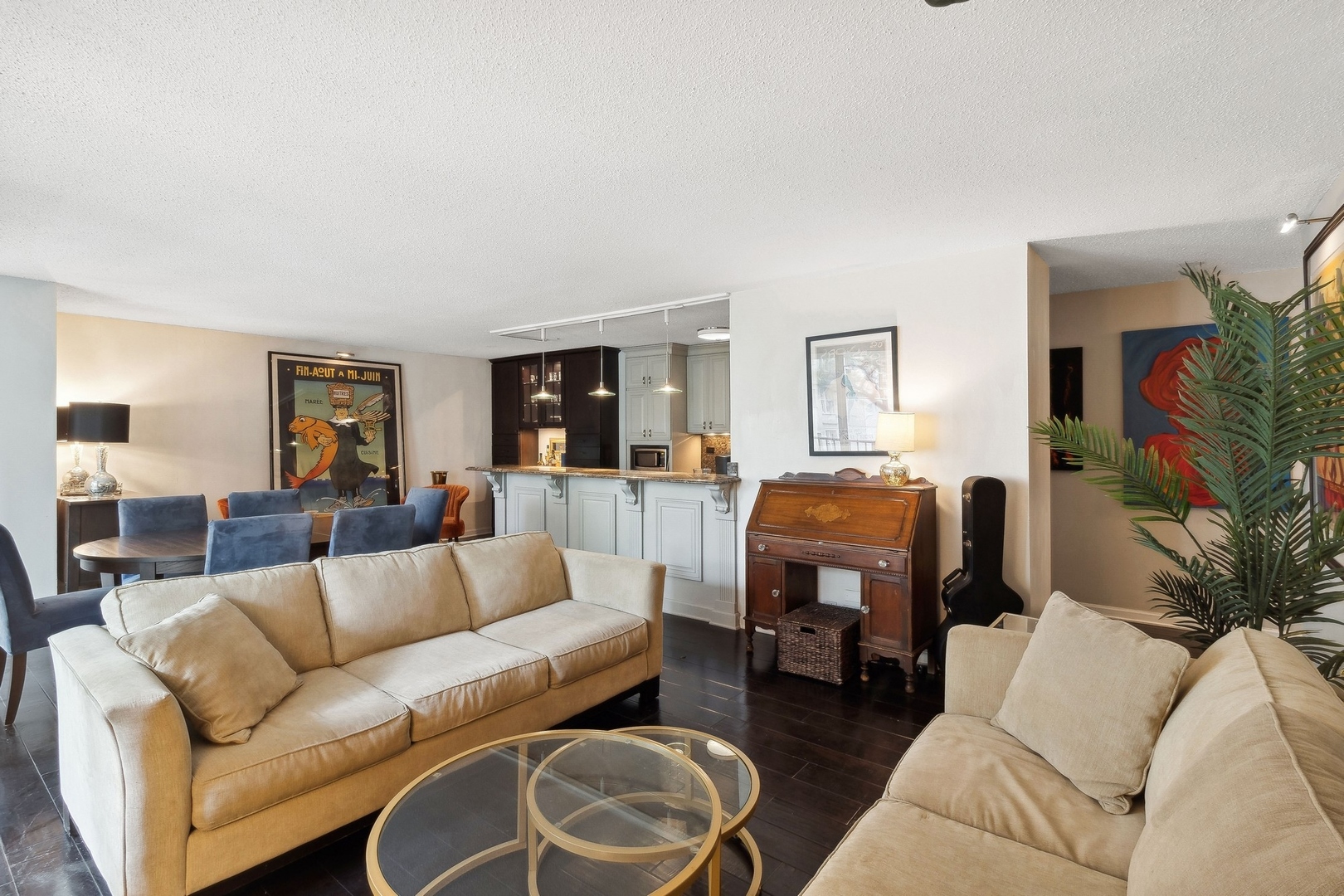 71 East Division Street, Unit 401 Chicago, IL 60611 - Photo 5 of 21 a living room with furniture and a large mirror with wooden floor
