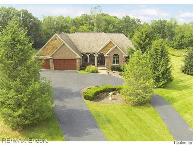 8629 Sashabaw Road Clarkston, MI 48348 - Photo 1 of 34 Welcome home to this Custom Built home and take in the views of nature all around you!