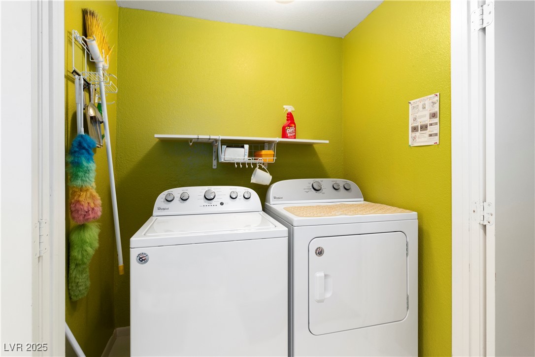 3859 Desert Marina Drive, Unit 257 Laughlin, NV 89029 - Photo 21 of 89 Laundry room with a textured wall and washing mach