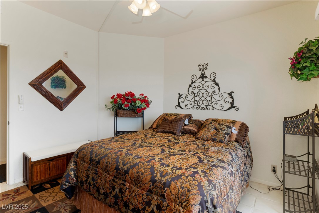 3859 Desert Marina Drive, Unit 257 Laughlin, NV 89029 - Photo 23 of 89 Primary Bedroom featuring light tile patterned flo